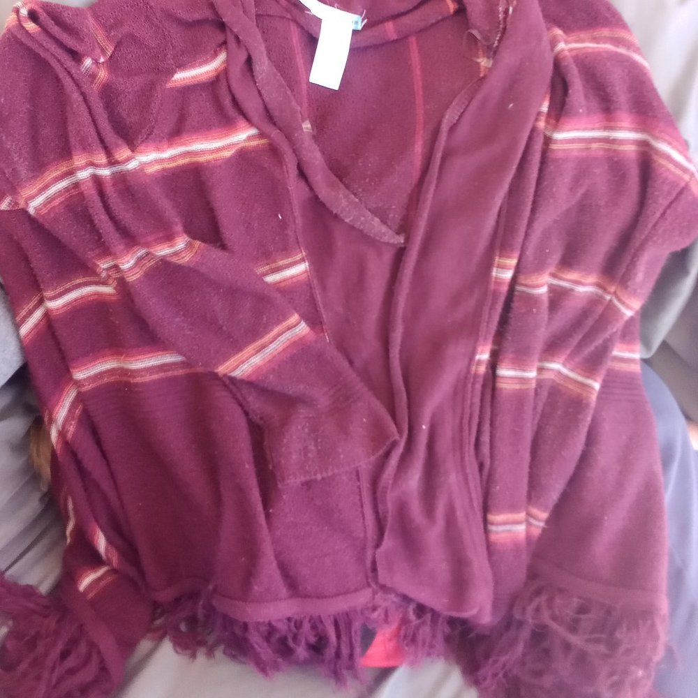 100% acrylic cardigan with fringe